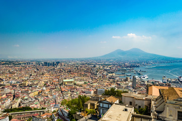 Naples, Italy - CIRCA 2013: Aerial/bird eye view of the city of Naples, Italy. The Bay of Naples and Mount Vesuvius are visible. Taken at a sunny summer day.