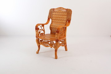 In some Asian countries and China, craftsmen use cane or wicker furniture on a white background. It...