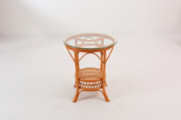 In some Asian countries and China, craftsmen use cane or wicker furniture on a white background. It...