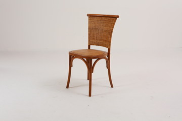 In some Asian countries and China, craftsmen use cane or wicker furniture on a white background. It...
