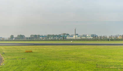 Amsterdam Schiphol,, a large green field