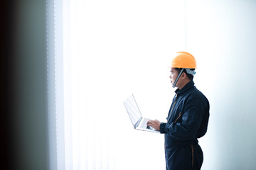 Pictures of architect builders studying project layout of a civil engineer room working with documents at an Asia construction site