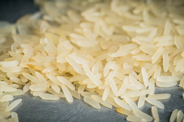 Raw rice on the kitchen table. Selective focus. shallow depth of field.