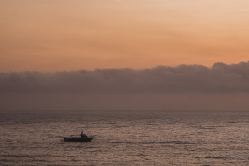 boat and dawn clouds