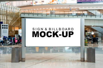 Mock up large blank advertising billboard at hall of airport