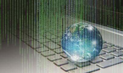 Glass globe on laptop keyboard with binary code "Elements of this image furnished by NASA "