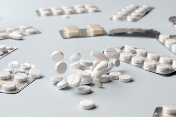 medicine on a blue background, top view
