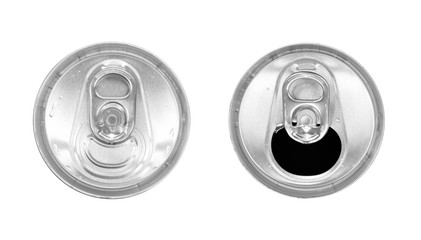 Drink in an iron jar. Open and closed banks. Top view. Close up. Isolated on a white background