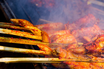 Close up of Roast or Grilled Chicken, Thai street food favorites.