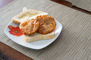 Nigerian deep fried Akara with bread and butter