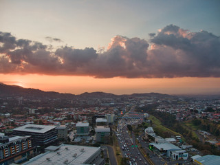 Fototapeta premium Sunset Aerial View of Escazu and Ruta 27 in Costa Rica