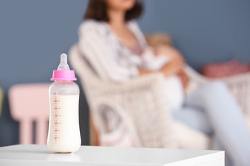 Bottle of milk on table in room