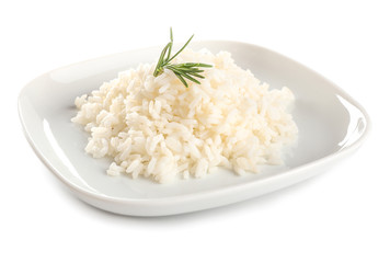 Plate with boiled rice on white background