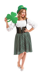 Beautiful young woman with paper clover on white background. St. Patrick's Day celebration