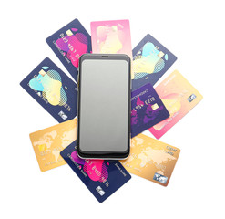 Credit cards with mobile phone on white background. Concept of online banking