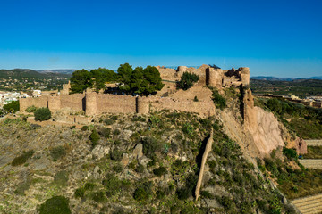 Fototapeta na wymiar Aerial view of medieval Onda castle near the capital of tile factories in Castillon Spain with an curtain wall strengthened by semi circular towers