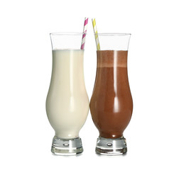 Glasses of tasty milkshakes on white background