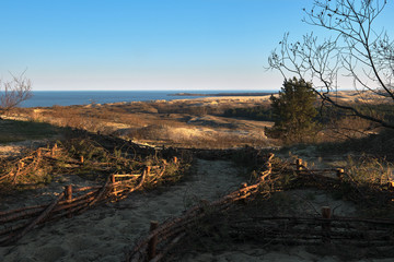 Sunset view of nordic dunes, early spring at Curonian spit, Nida, Klaipeda, Lithuania