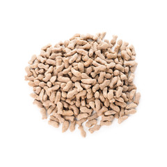 Heap of dry pet food on white background