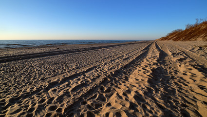 Sunset at Baltic sea and nordic dunes of Curonian spit, Nida, Lithuania