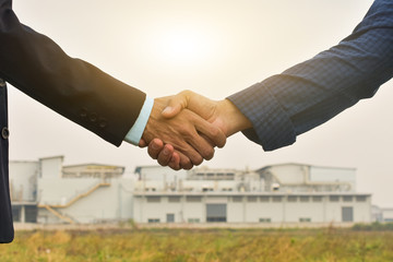 Close up hands shake business agreement success concept