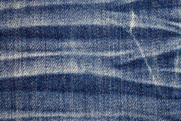 Naklejka premium Jeans torn denim texture background.
