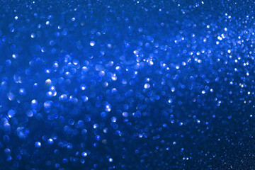blue blur bokeh glitter vintage lights background.