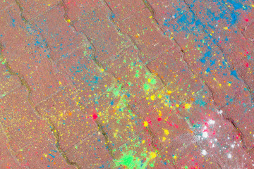 Background of colorful Holi powder on the ground