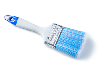 blue paint brush with white handle isolated