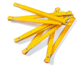 yellow wooden meter isolated on white