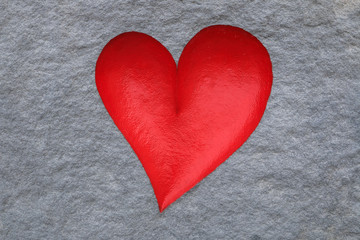 red heart on wooden background