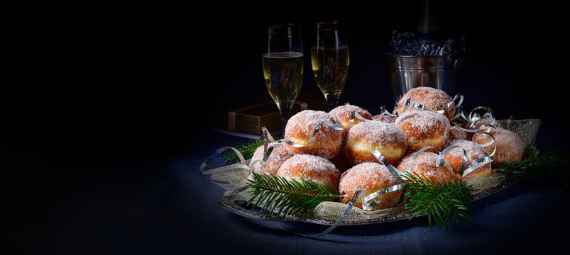 Fine Berlin donuts with jam filling and icing