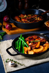 Rib of pork with beans and quarter potato