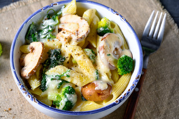 Real pasta with mushrooms, spinach and broccoli