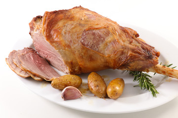 baked lamb leg with sauce and potato