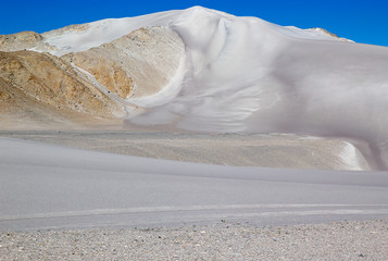 White dune at the lava field of the volcano Caraci Pampa at the Puna de Atacama, Argentina