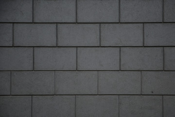 texture of dark brick gray wall