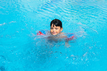 Child in swimming pool