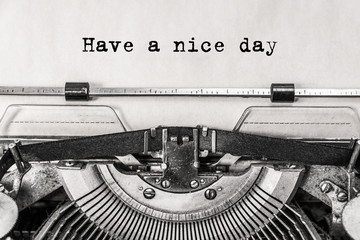 Have a nice day. text typed on an old typewriter. Wish a good time