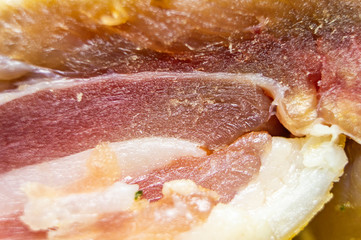 Close-up of jamon meat and fat. Macro photo