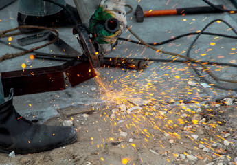 Sparks from welding at a construction site