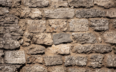 Wall of old stone bricks as a background