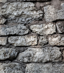 Wall of old stone bricks as a background