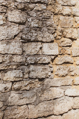 Wall of old stone bricks as a background