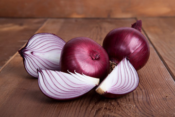 Onion on the wooden table.