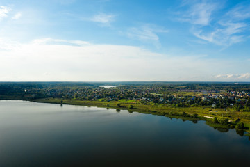 Aerial view of the lake and village houses located on its shore