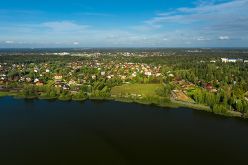 Aerial view of the lake and village houses located on its shore