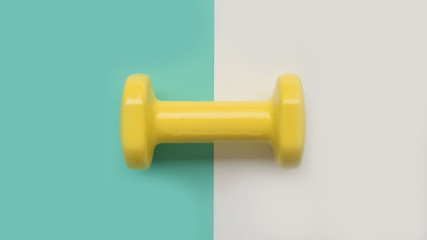 close up of dumbbell on white and green background
