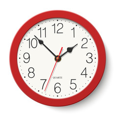 Red round wall clock isolated on white background