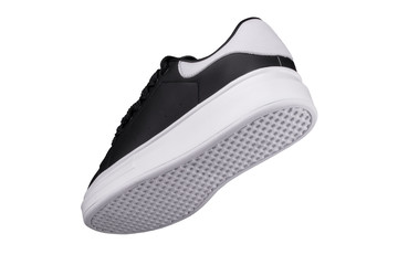 Black sneaker with white sole. Sport shoes.